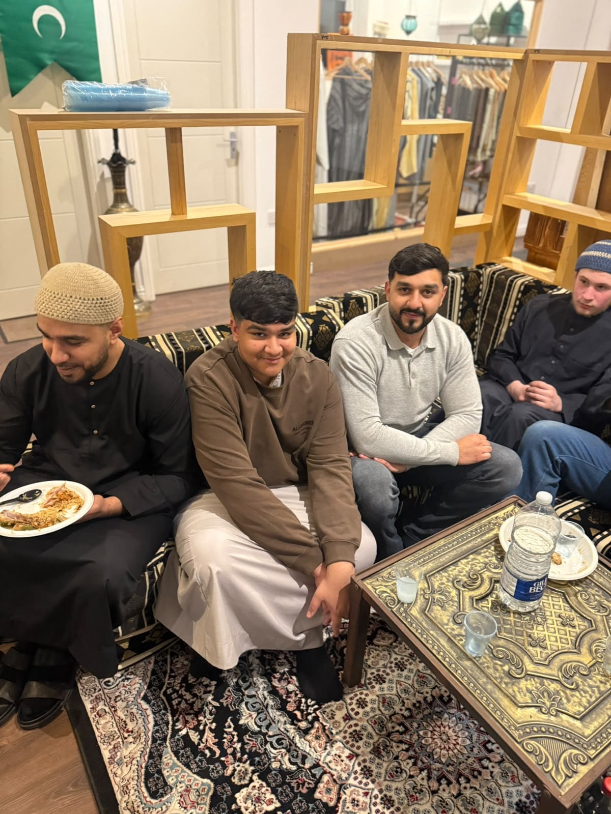 Brothers eating together after a gathering.
